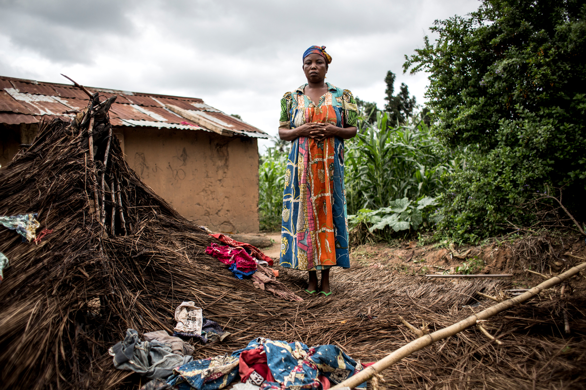 Democratic Republic of Congo. An internally displaced women stands next to her resuarant that was destroyed during fighting.