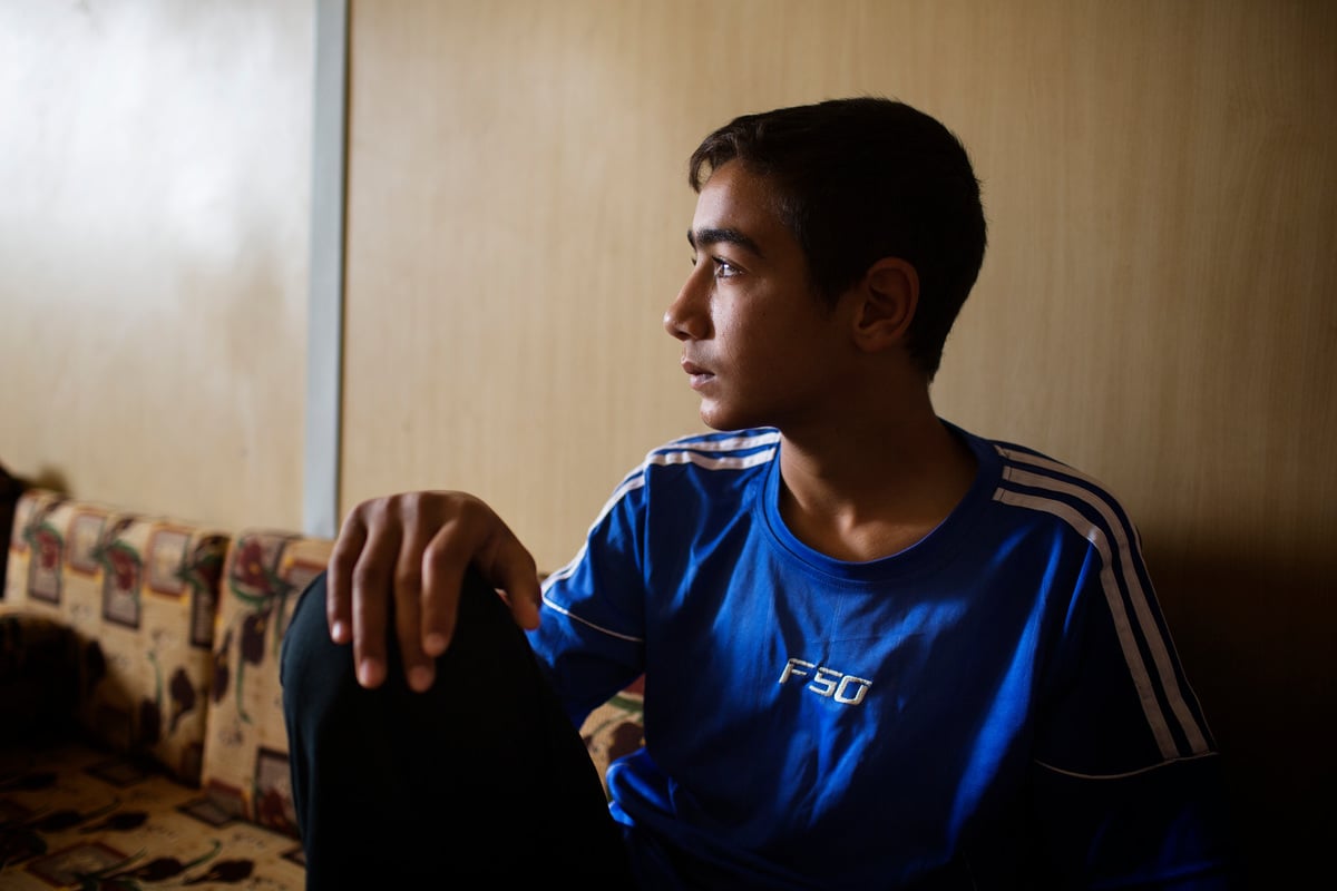 Syrian wrestling champ inspires young refugee's dreams