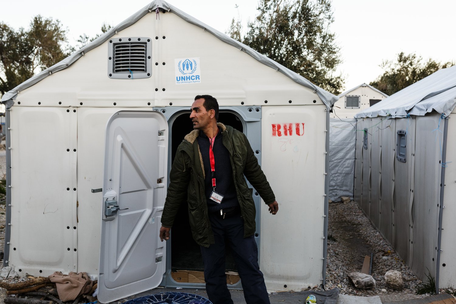 Greece. The Syrian electrician installing power at Lesbos refugee camp
