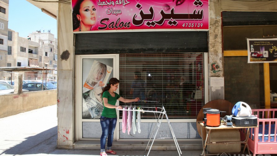 Sherien, a 36-year-old displaced Syrian woman benefitted from UNHCR’s livelihood programmes to open a beauty salon and start a new life. ; Sherien started to work as a hairdresser in Homs since she turned 18. Sherien applied to Hairdressing Courses conducted by our partner Department of Ecumenical Relations and Development (GOPA), the courses are part of UNHCR’s vocational Training Programme. She excelled and got two certificates in hairdressing, and she was just getting started. Sherien later completed Entrepreneurial skills training course which qualified her to apply for a Small Business Grand from UNHCR, designed to help the displaced people inside Syria to start their own business, which in Sherien’s case, was a Hairdressing Salon. The new salon blew a fresh breath not only in Sherien’s life, but in the life of her family as well.
