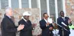 UNHCR Representative Stefano Severe (left) and Prime Minister Apolo Ns...