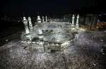 Muslim Pilgrims circle the Kaaba at the Grand Mosque in Mecca. A new b...