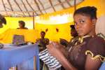 A group of displaced women making handicrafts in eastern Congo. Displa...