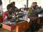 Women work with sewing machines in the vocational training centre in B...