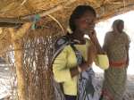 Takwa Banderdin, a Sudanese refugee, looks happy after hearing that sh...