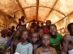 Smiling Ivorian children return home on a UNHCR convoy to Danane in C�...