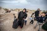 When Hala crossed the border into Jordan, dragging a large black bag w...