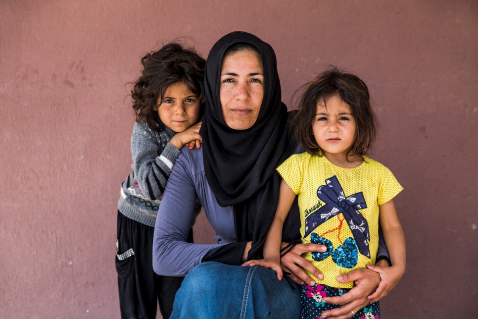 Juria, 31, pictured with her daughters Manal, 7, and Fatima, 3, in Torbali, Turkey. 