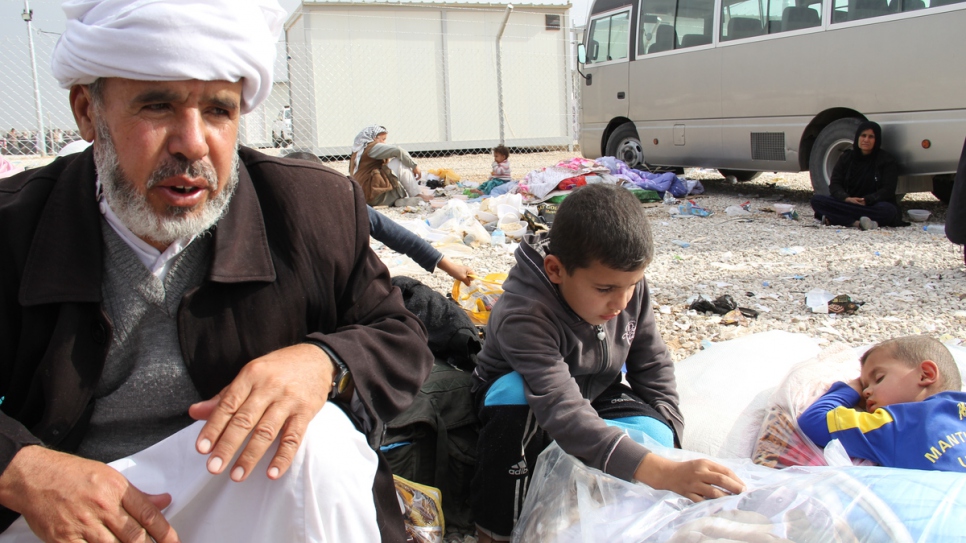 "Even though we are very tired and hungry, we feel safe. We are free," says Khairo Murat Mirza, 55. The father of nine slept outside on his first night after arriving at a full-to-capacity camp for internally displaced people near Hasansham, 30 kilometres from Mosul.