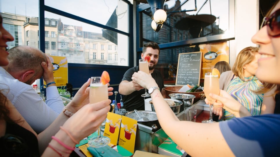 Elias and customers raising their glasses at Chez Richard in Brussels. 

All the pictures were taken by Bea Uhart
