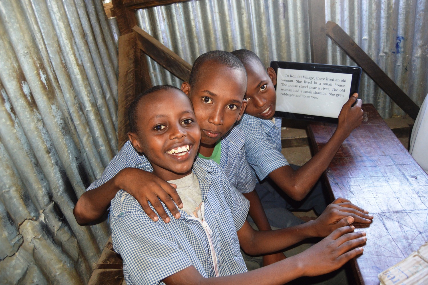 Kenya. Students using tablets from the Instant Network Schools project in Kakuma