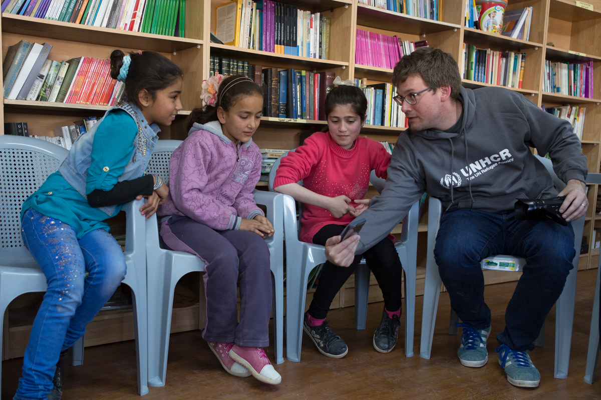 Jordan. UNHCR High Profile Supporter John Green meets Syrian refugees from the skills training group for young girls at UNHCR funded community centre