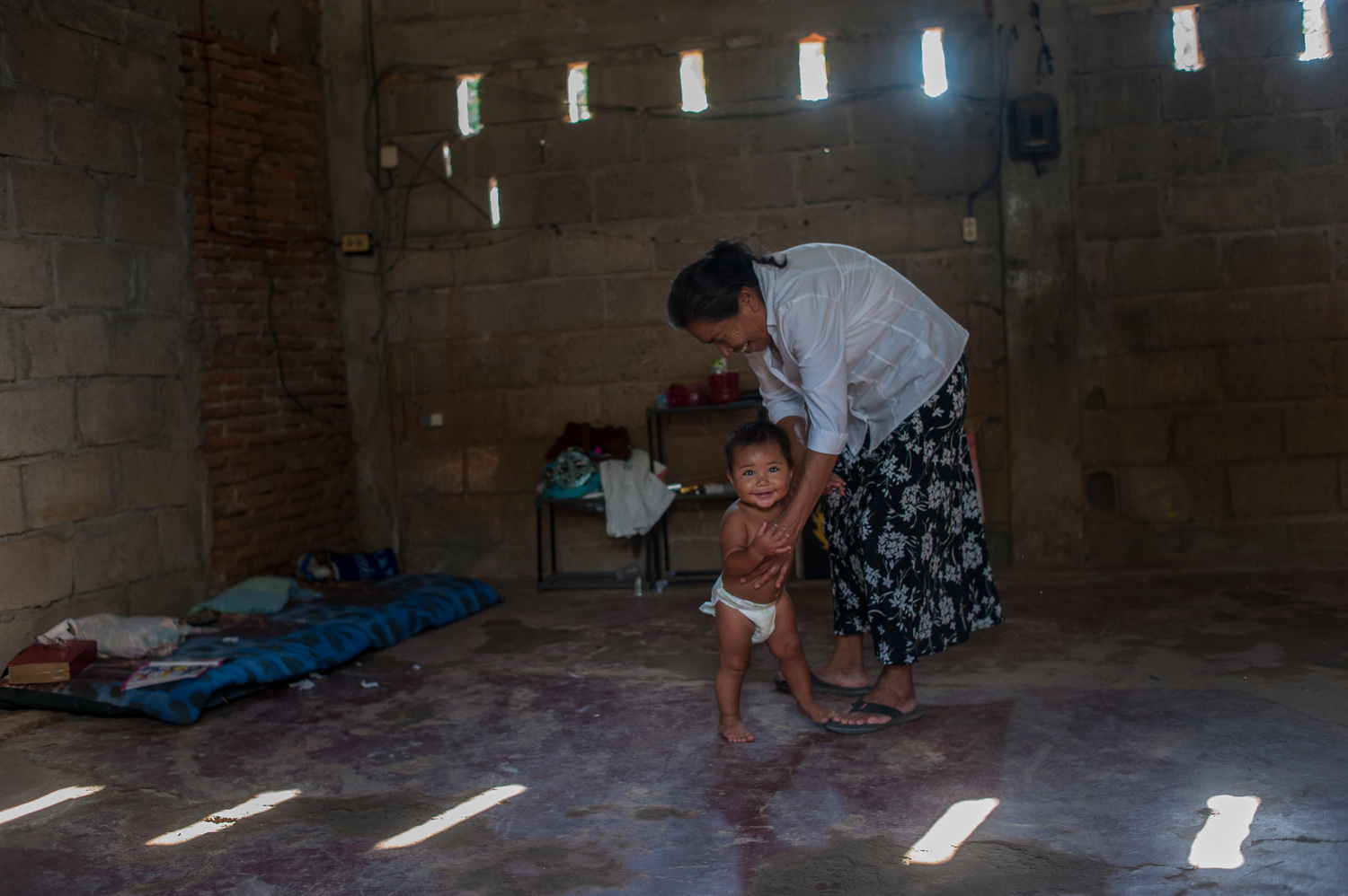 Elder woman escaped from violence of El Salvador, feels happy in her new life in Chiapas, Mexico.