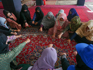 Women take part in a group counselling session at a mosque in Bamyan in Afghanistan's Central Highlands