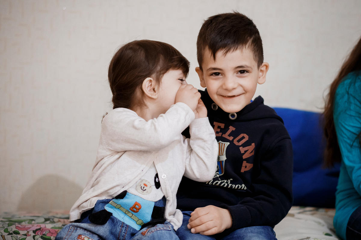 Belarus. Refugee children of a resettled Syrian family in their new home in Gomel