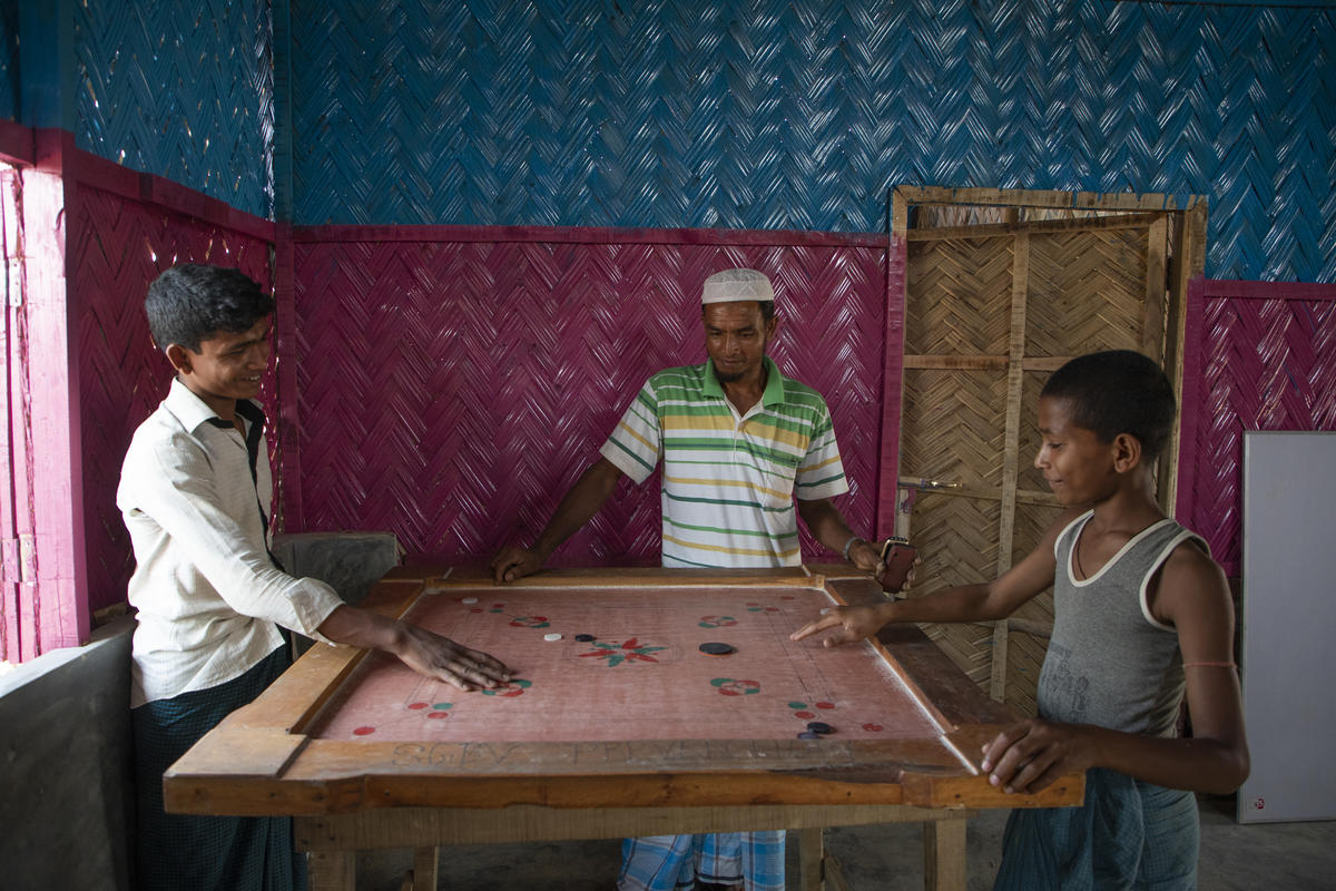 Bangladesh. Young Rohingya Refugees   play carrom, a South Asian board game.