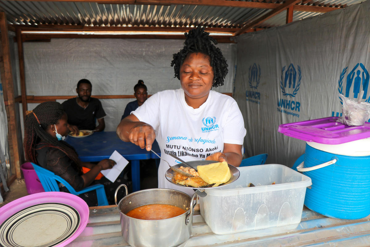 Angola. Market in Lovua settlement provides refugees with food and supplies