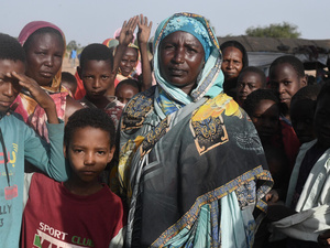 Amdafock, CAR. A group of Sudanese refugees pose while waiting to be registered as refugees