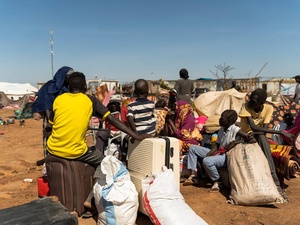 Refugees from Sudan wait at the Joda border point in South Sudan's Upper Nile State for transportation to the transit centre in Renk. 
