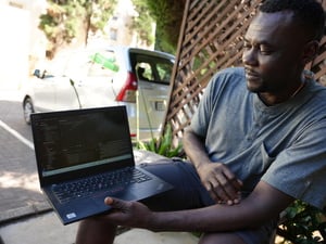 South Africa.  Congolese refugee returns home to rebuild his community with IT skills gained in South Africa