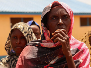After fleeing conflict in Sudan, Aisha led her daughters and ten grandchildren through the mountains to find safety in South Sudan.