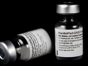 Empty bottles of Pfizer/BioNTech COVID-19 vaccine are pictured in Bad Windsheim, Germany December 27, 2020. 