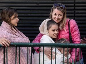 Refugees from Ukraine wait to be registered at UNHCR's cash enrolment centre