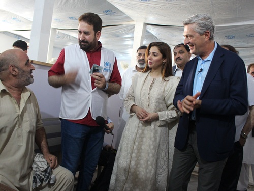 Pakistan. Goodwill Ambassador, Mahira Khan, observes as Afghan refugees go through resettlement process. 