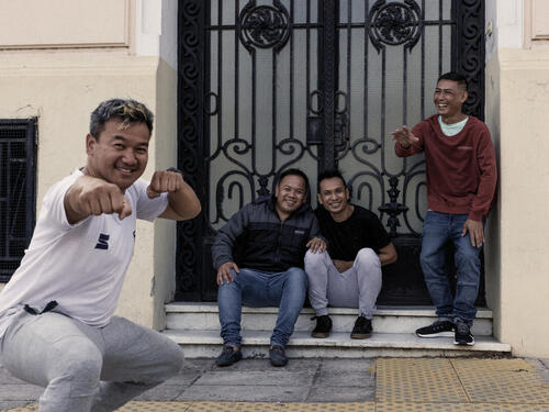 Argentina. Decades after they were resettled to Argentina, a group of Laotian refugees meet up to recreate a photo taken shortly after their arrival in Buenos Aires.