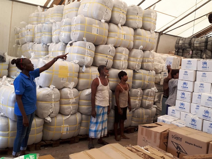 Robina at work in the UNHCR warehouse in Cox's Bazar, Bangladesh.