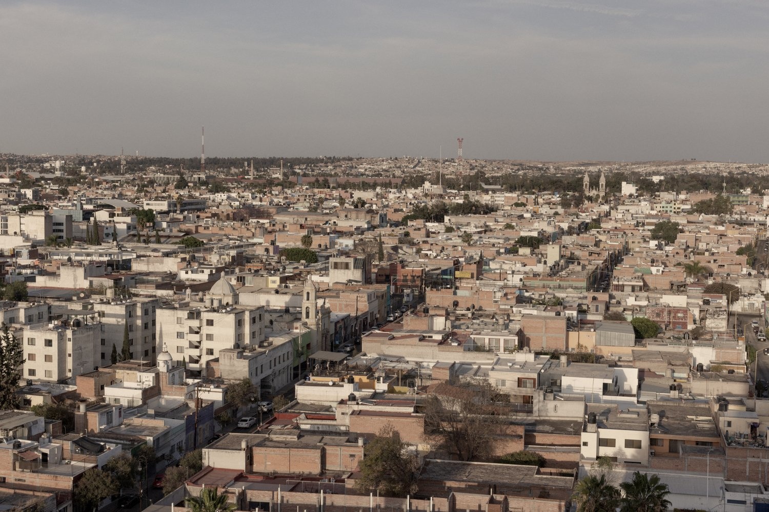 A rooftop view of a city.