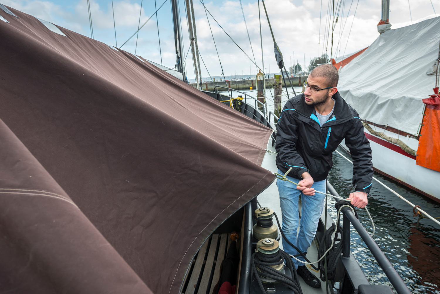 Germany. Syrian father and son use sewing skills to start new lives