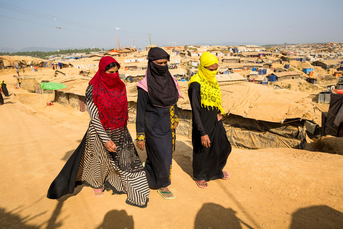 Bangladesh. Female head of households recieve assistance from Community Outreach Volunteers