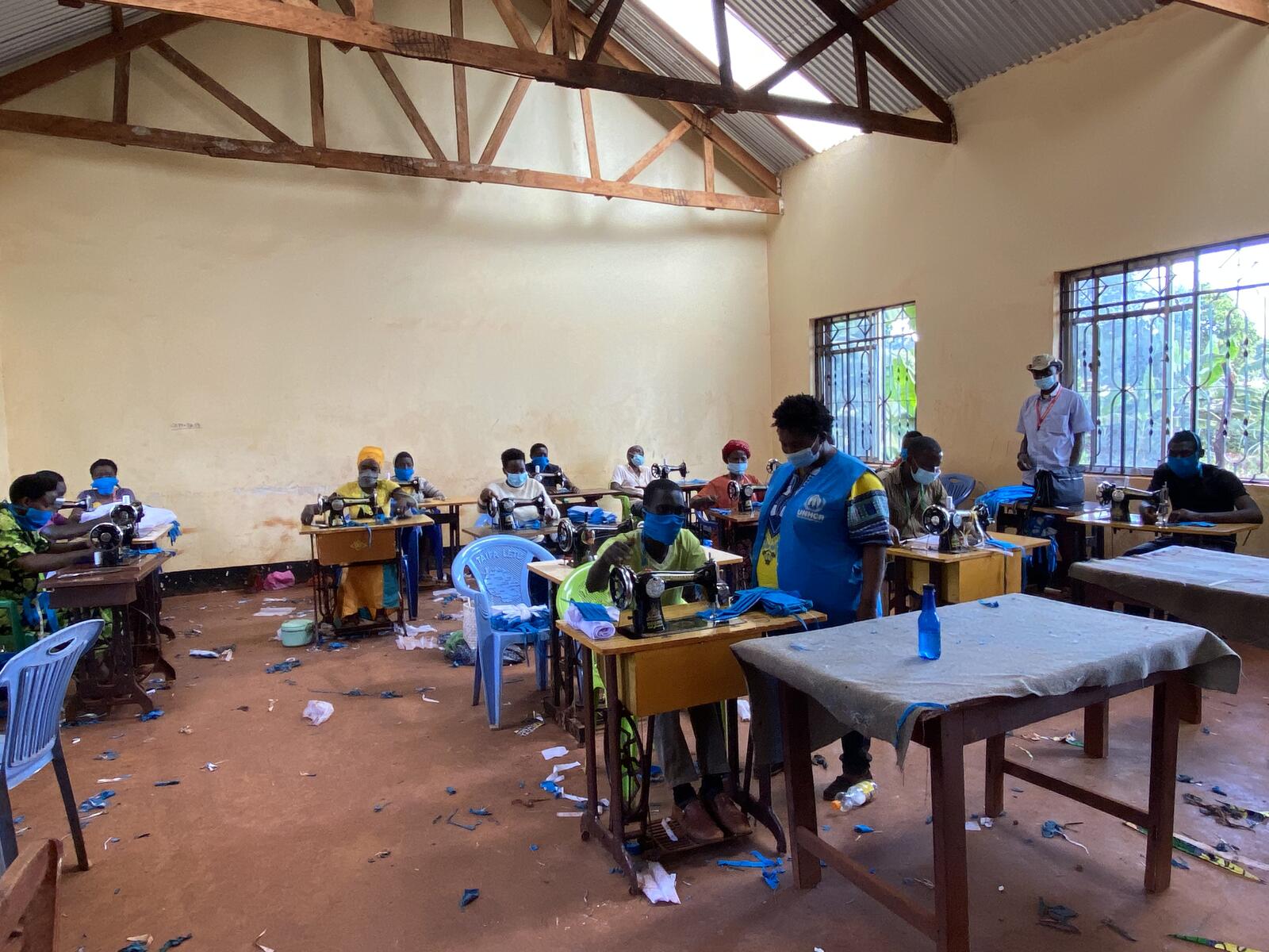 Tanzania. Refugees make masks