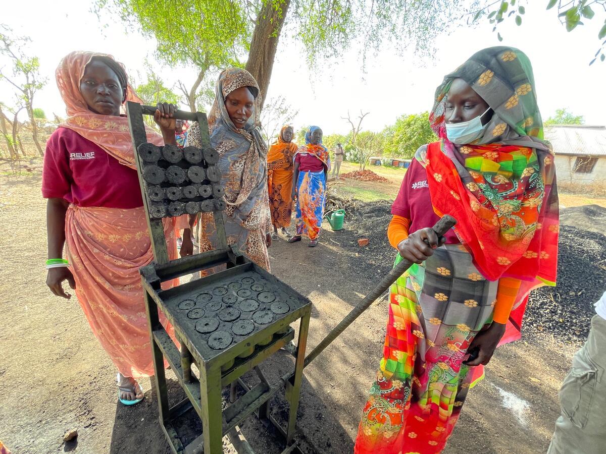 South Sudan. Refugees and host community work together to make clean, sustainable fuel