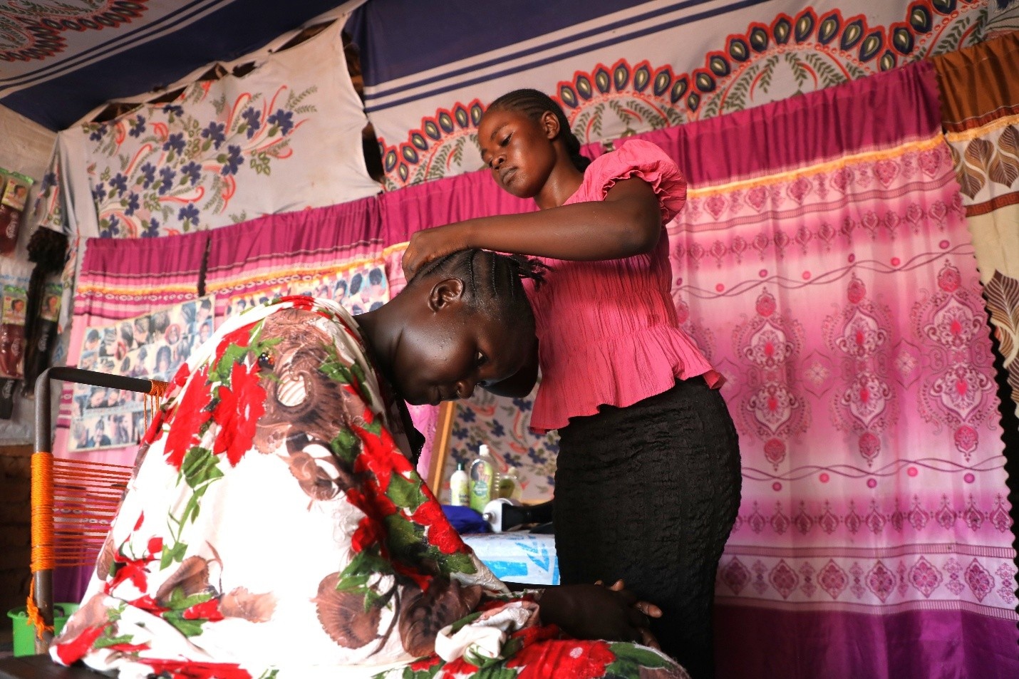 Maha at her salon business inside the Ajoung Thok market in South Sudan.