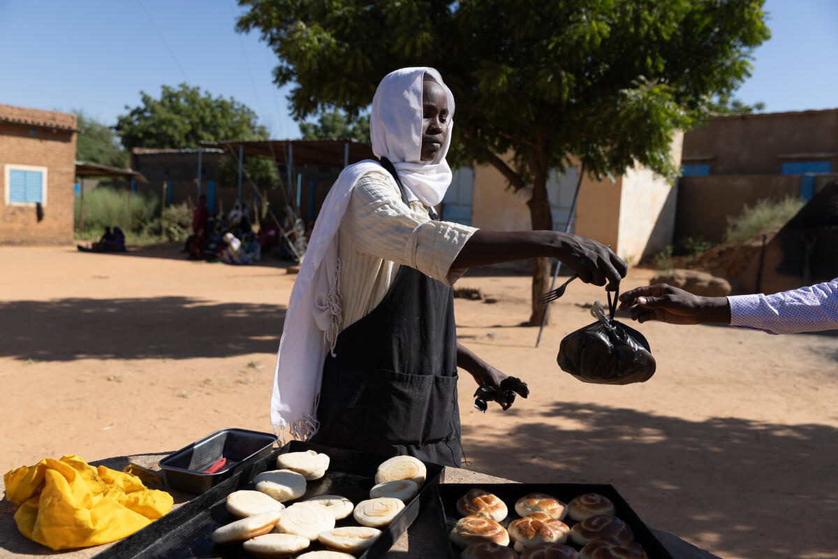 Chad. Two groups of refugees support each other in Farchana Settlement
