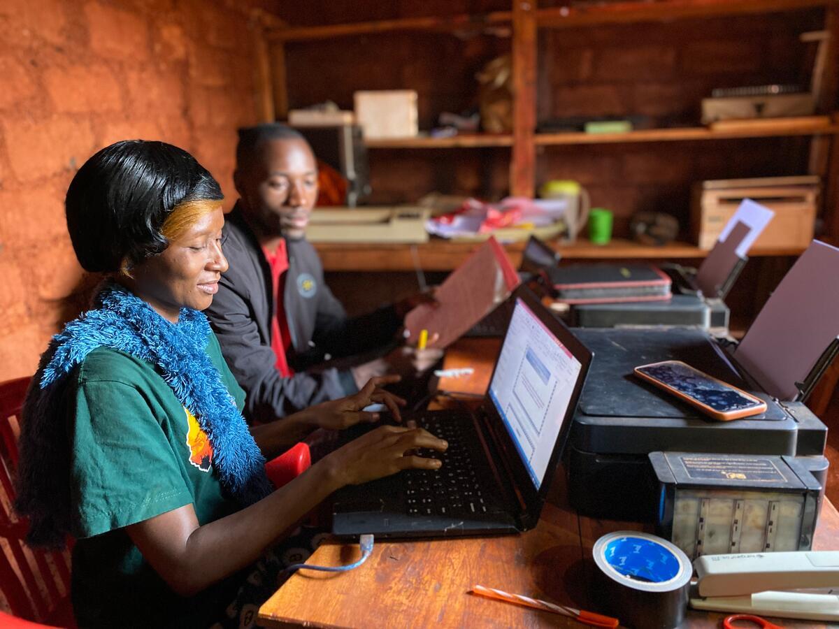 Tanzania. Rehema with her colleague at the computer shop