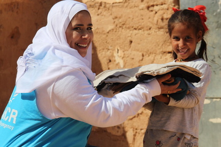 Algeria. UNHCR distribution of winter clothes donated by UNIQLO