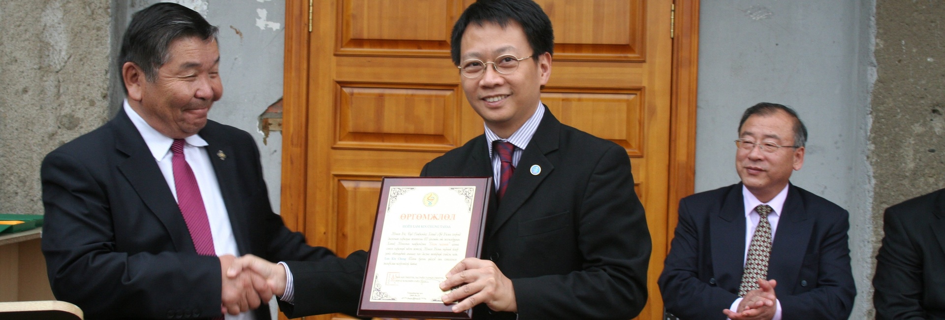 Dr. Lam sponsored cataract operation in Mongolia and was presented Honorary Award by yje ministry of Health in 2009