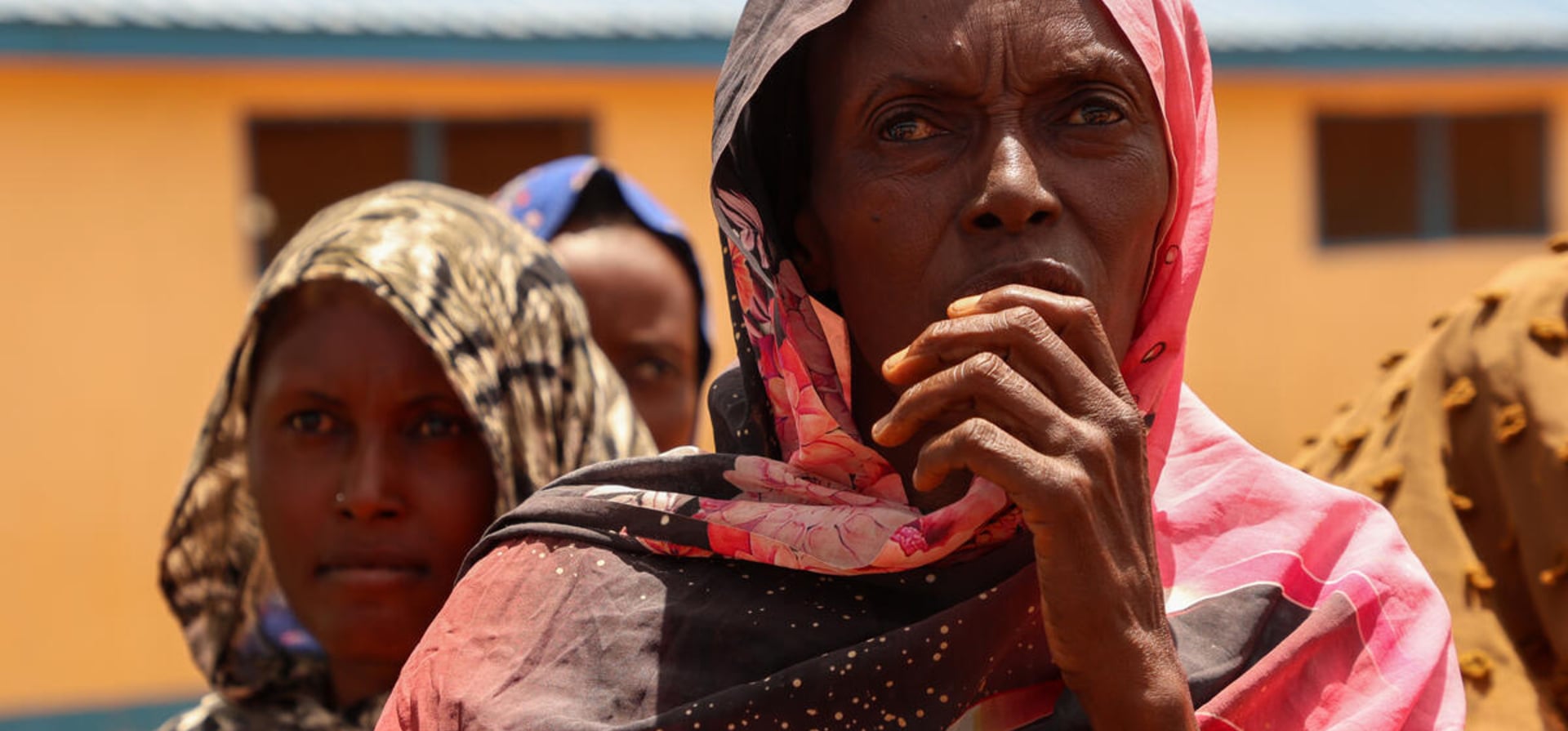 After fleeing conflict in Sudan, Aisha led her daughters and ten grandchildren through the mountains to find safety in South Sudan.