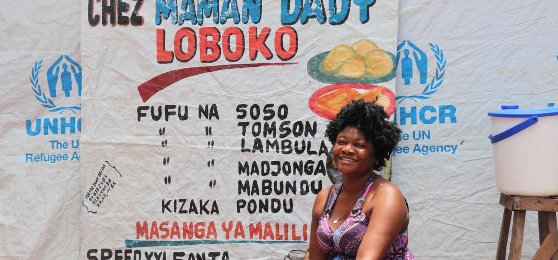Angola. Restaurant owner in Lovua settlement