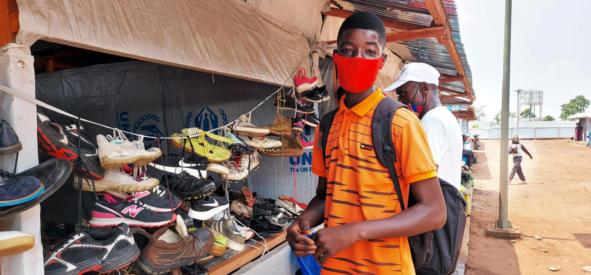 Angola. Market in Lovua settlement provides refugees with food and supplies