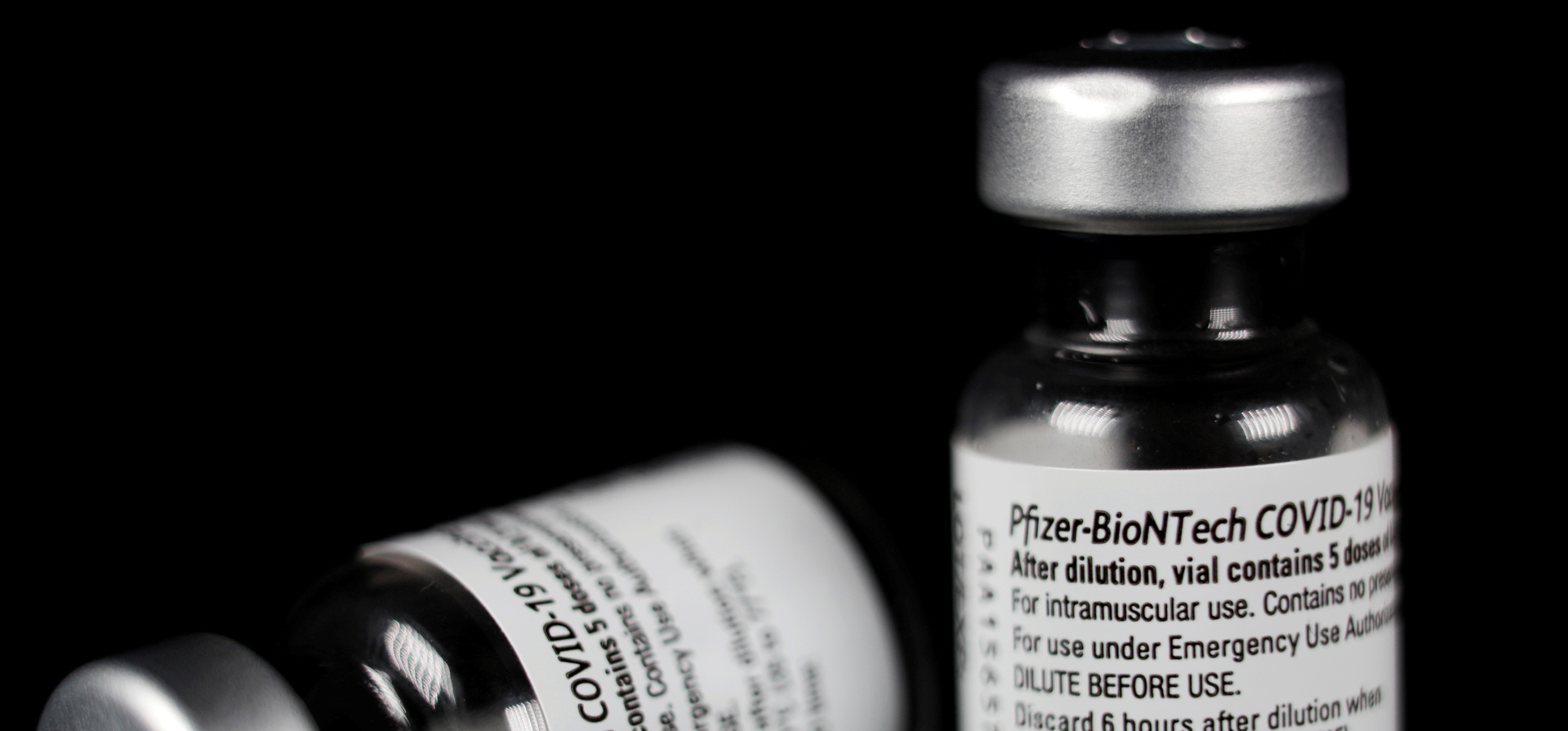 Empty bottles of Pfizer/BioNTech COVID-19 vaccine are pictured in Bad Windsheim, Germany December 27, 2020. 