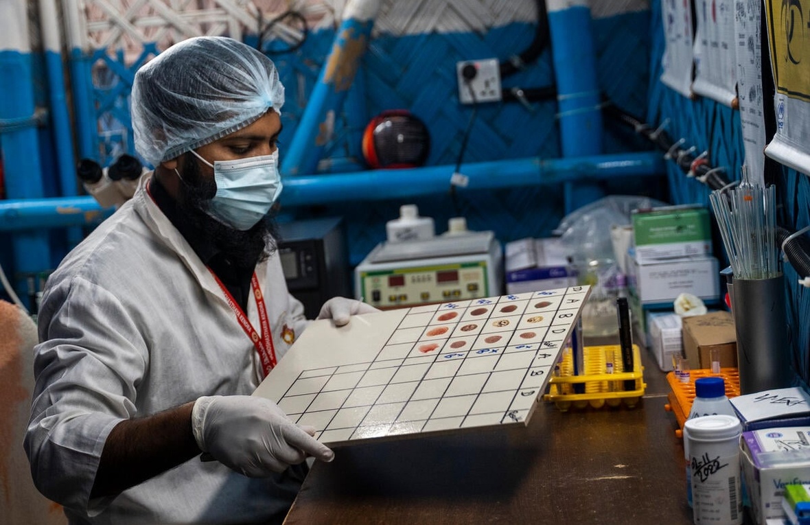A lab technologist tests blood samples at a health care centre in Kutupalong refugee camp, Cox’s Bazar, Bangladesh. 