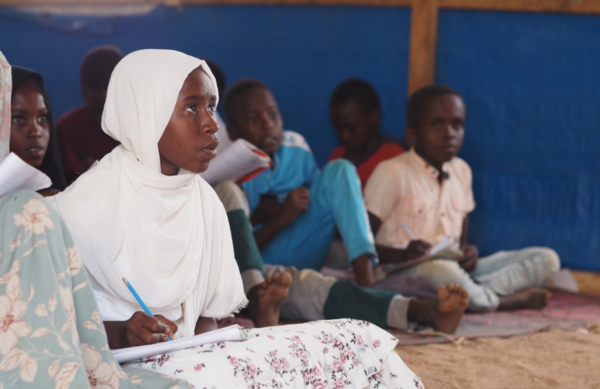 Isra attends her favorite science class. 