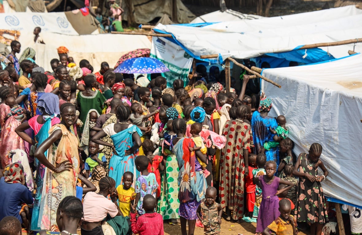 South Sudanese refugee women gather outside a nutrition center in Matar, Gambella, waiting to receive critical assistance. 