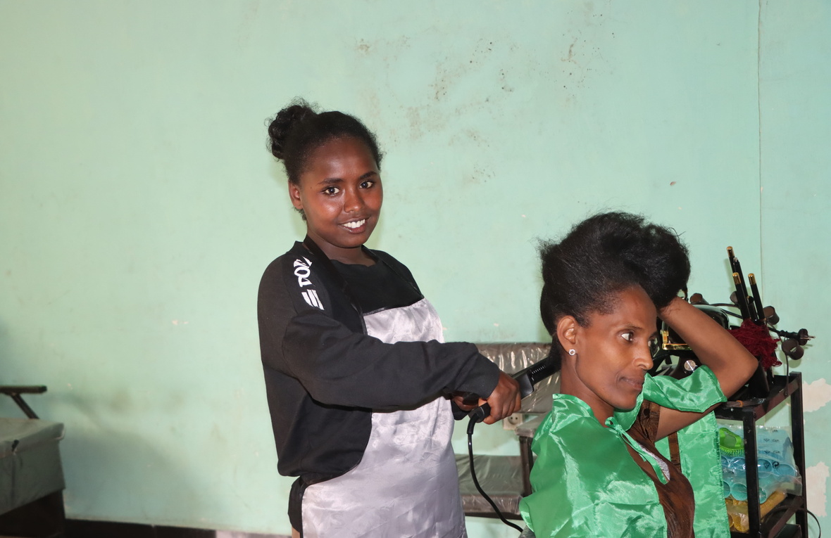 Kidist, formely displaced in Tigray, now back home and working at her salon in Alamata town, Ethiopia.