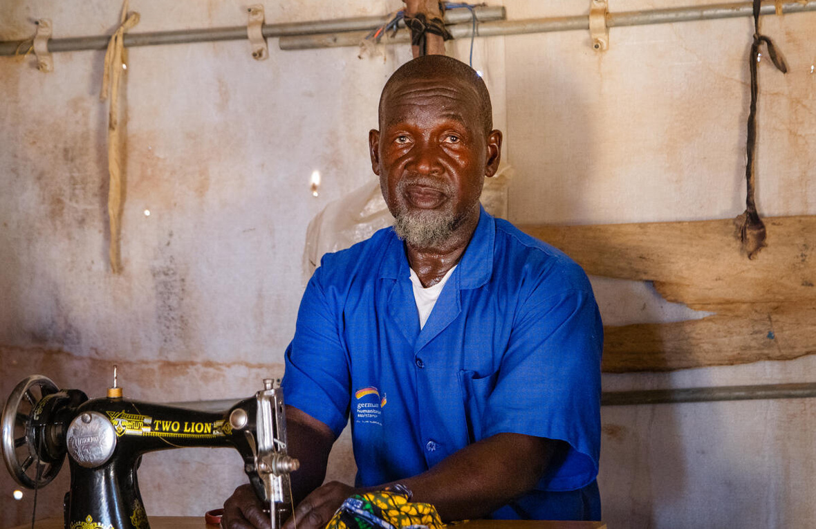 Niger. A malian refugee in his tailoring workshop