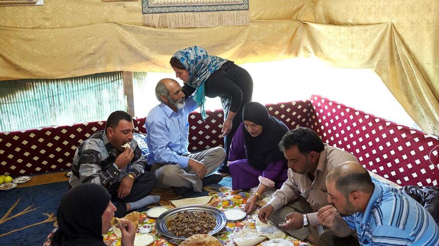Lebanon. A Syrian refugee family forgets war and celebrates Eid al-Adha